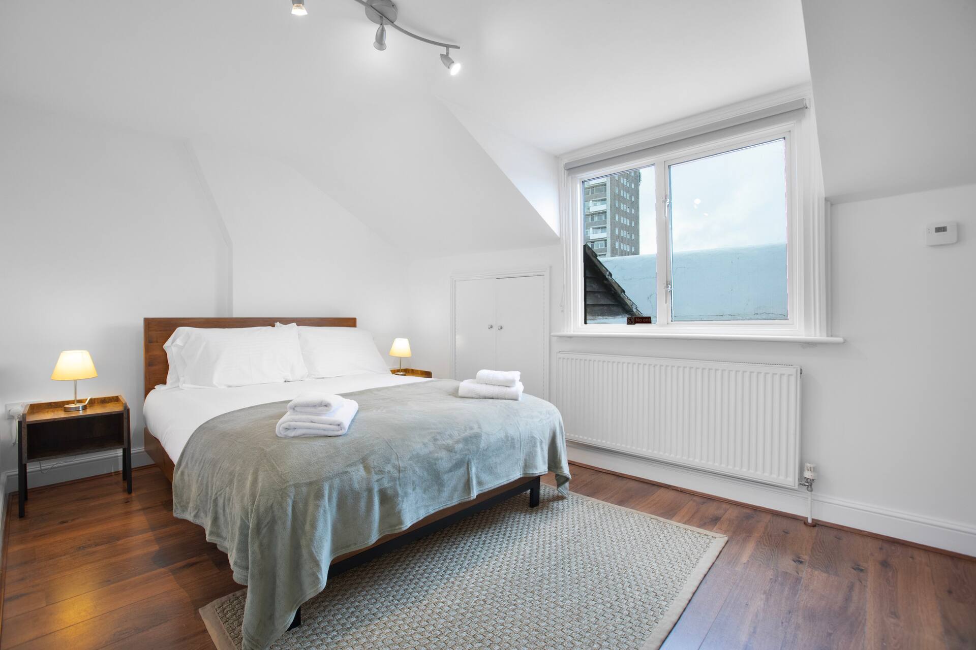 Loft bedroom with character in the Notting Hill duplex apartment