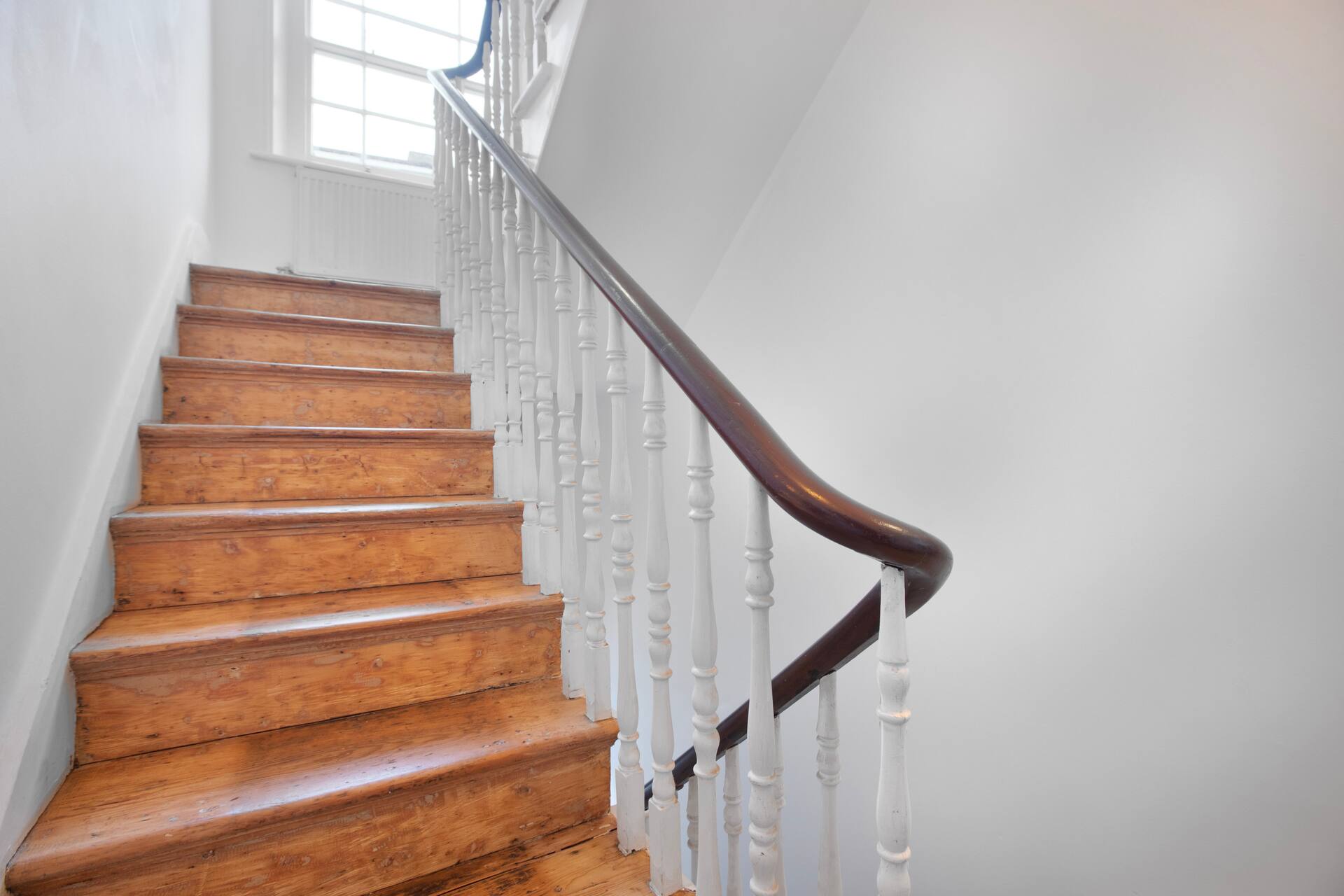 Victorian staircase with traditional banister